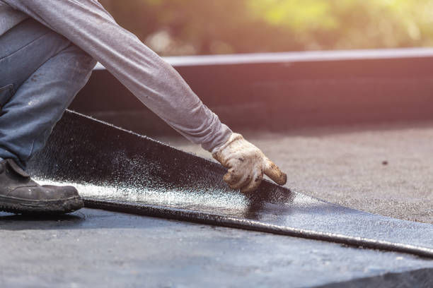 Professional Waterproofing technician working in Hilton, NY